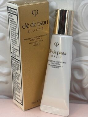 Cle de peau beaute protective fortifying emulsion broad spectrum spf 22